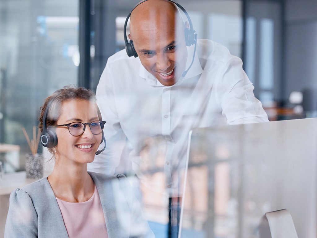 Woman using a voip business phone systems to make money